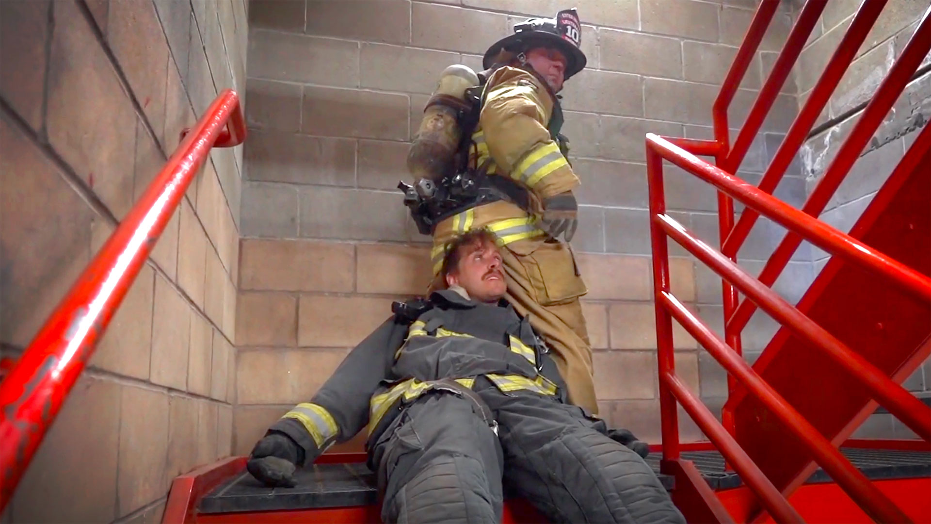 Featured image for “How to remove a fallen firefighter from a stairwell using various fire rescue techniques, pending on how many crewmates are available to assist.”